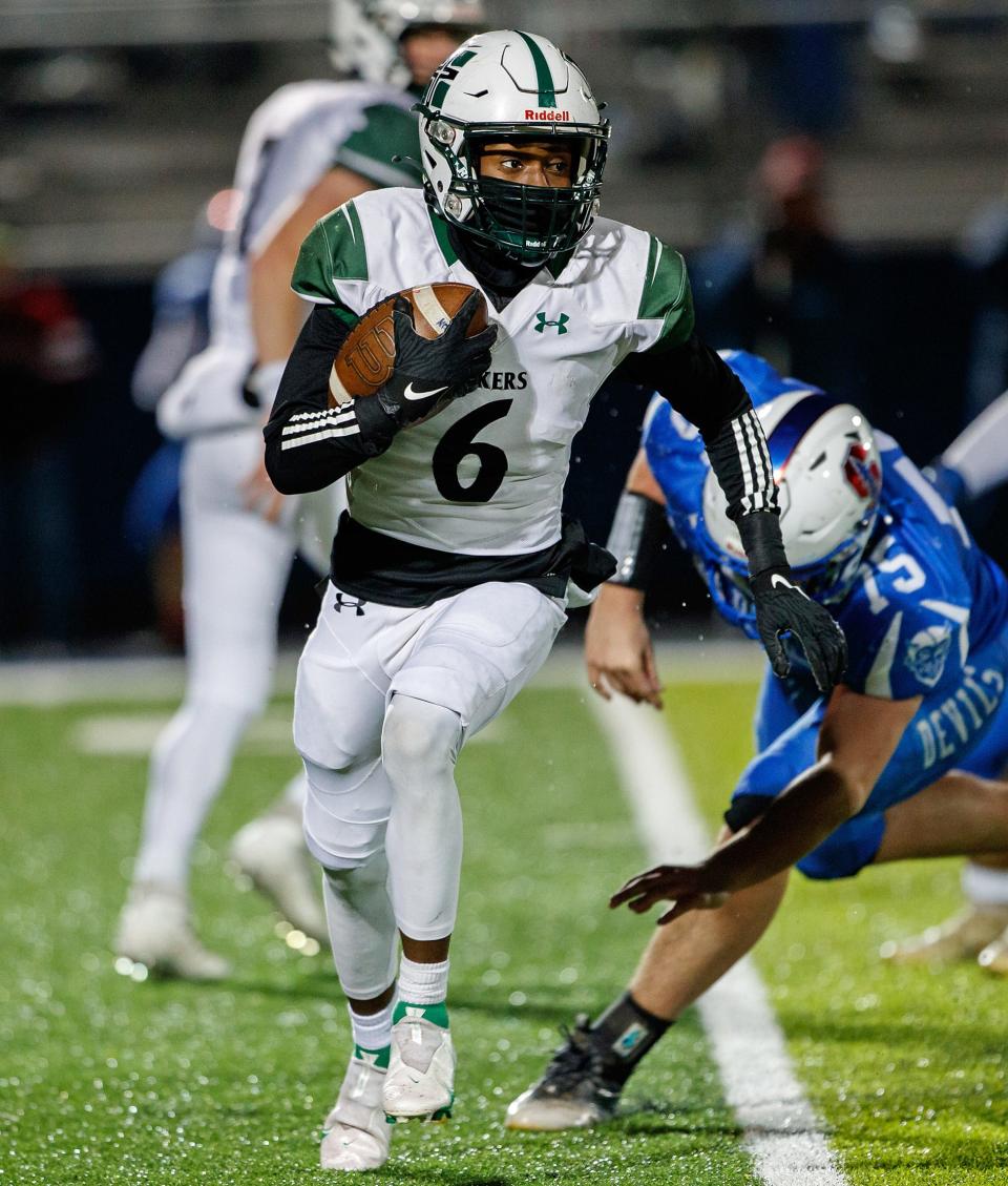 Mercyhurst Prep's Ja’son Ellman carries the ball against Sharpsville on Nov. 12, 2022, during a D-10 Class 2A football semifinal at Farrell High School.