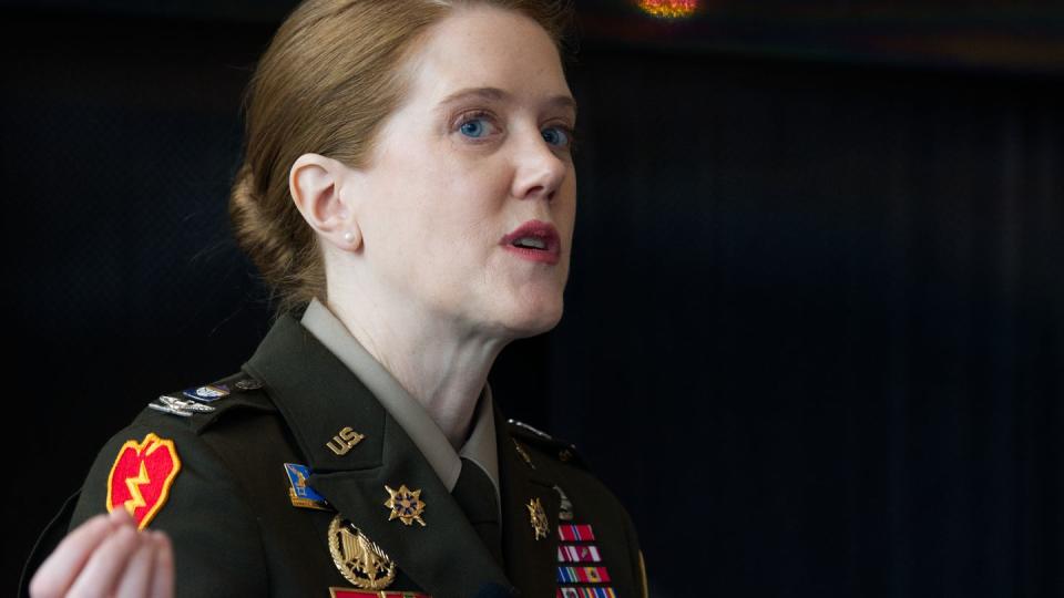 Col. Candice Frost, commander of the Joint Intelligence Operations Center at U.S. Cyber Command, gestures as she speaks Feb. 28, 2023, at an event hosted by Billington Cybersecurity. (Colin Demarest/C4ISRNET)