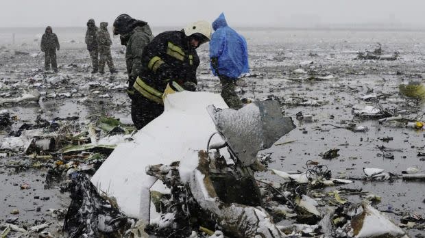 Authorities search through the plane wreckage and managed to secure both of the plane's black boxes. Photo: AP