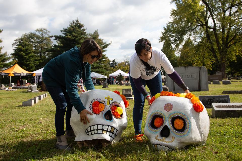 Calaveras - ornately decorated skulls - are set out during last year's Day of the Dead at Green Lawn Cemetery.