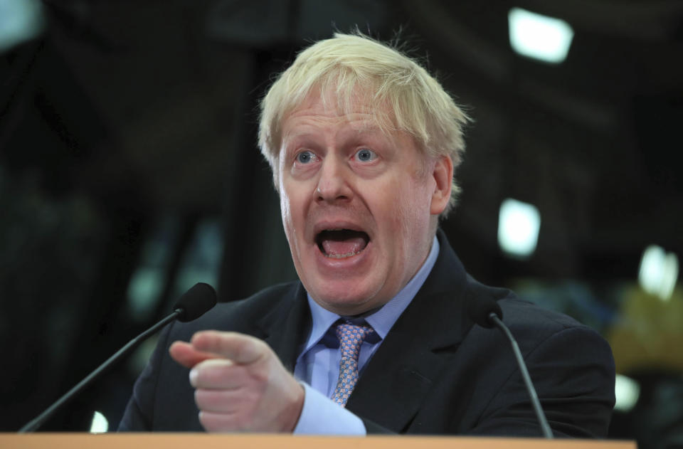 British lawmaker Boris Johnson speaks at the headquarters of construction equipment company JCB in Rocester, England, Friday Jan. 18, 2019. The former Foreign Secretary Johnson made his speech as a leading advocate of Britain's Brexit split from Europe. (Peter Byrne/PA via AP)