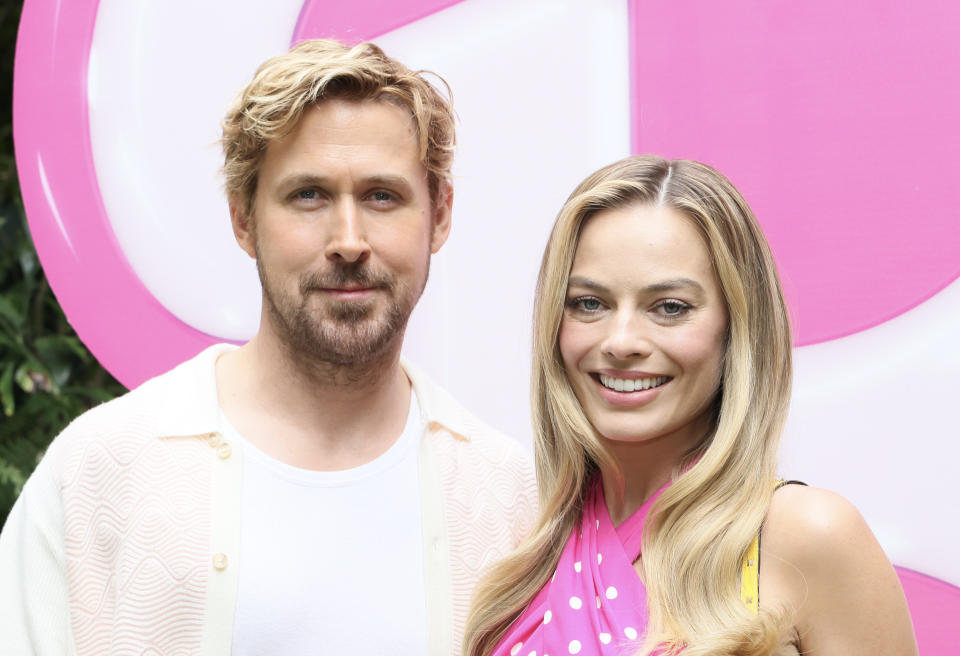 LOS ANGELES, CALIFORNIA - JUNE 25:  (L-R) Ryan Gosling and Margot Robbie attend the press junket and photo call for 