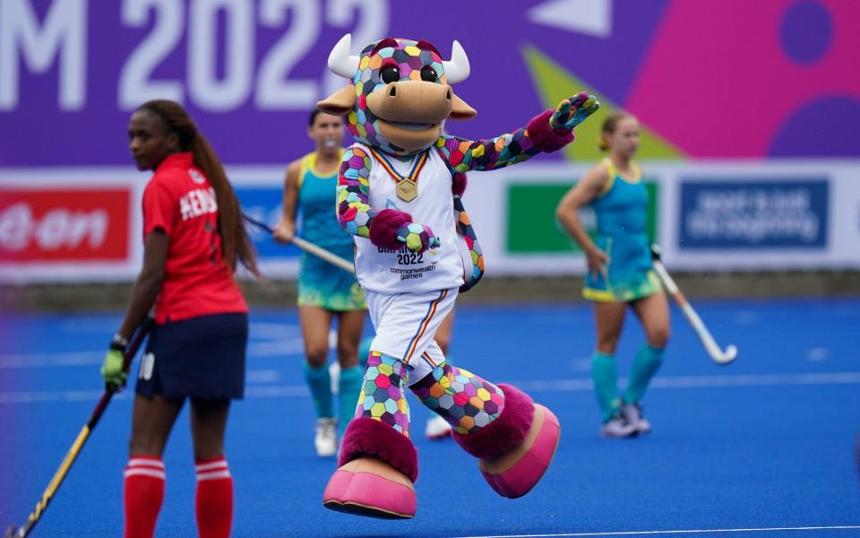 Perry the Bull invades the pitch during the Australia v Kenya women's hockey match - PA