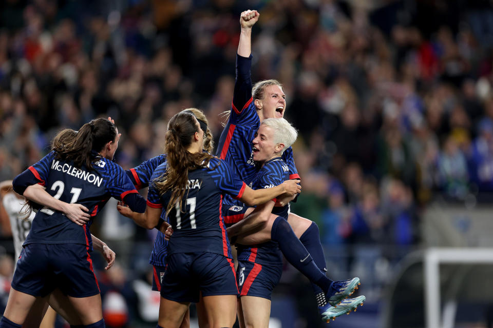 OL Reign celebrates a goal during their quarterfinal win. (Steph Chambers/Getty Images)