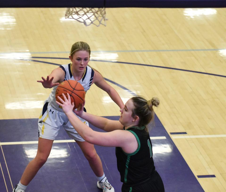 Avery Hinson held Grand View Christian's all-everything guard Kelly DeMeulenaere scoreless during Nevada's 49-42 victory over Grand View Christian Thursday at Nevada.
