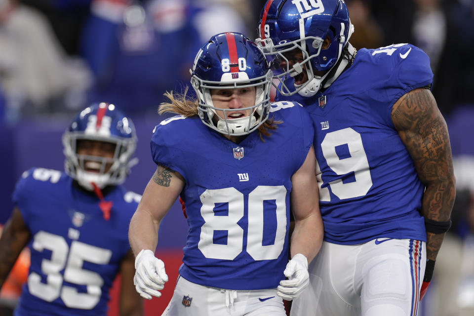 New York Giants wide receiver Gunner Olszewski (80) celebrates after running in a touchdown on a punt return during the second half an NFL football game against the Los Angeles Rams, Sunday, Dec. 31, 2023, in East Rutherford, N.J. (AP Photo/Adam Hunger)