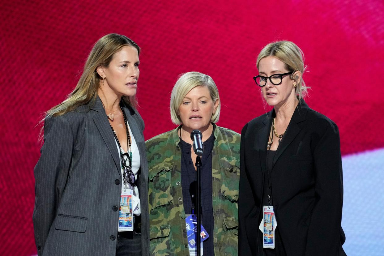 Emily Robison, Natalie Maines and Martie Maguire of The Chicks rehearse singing the national anthem before the start of the final day of the Democratic National Convention at the United Center.