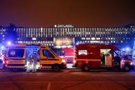 Medical personnel in ambulances with COVID-19 patients wait in the queue at Santa Maria hospital, amid the coronavirus disease (COVID-19) pandemic in Lisbon