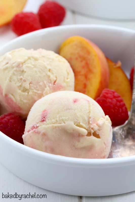 <p>Creamy homemade peach ice cream with raspberry swirls. It's the perfect summer treat!</p><p><strong>Get the recipe: <a href="https://www.bakedbyrachel.com/peach-ice-cream-with-raspberry-swirls/" rel="nofollow noopener" target="_blank" data-ylk="slk:Peach Ice Cream with Raspberry Swirls;elm:context_link;itc:0;sec:content-canvas" class="link ">Peach Ice Cream with Raspberry Swirls</a></strong></p>