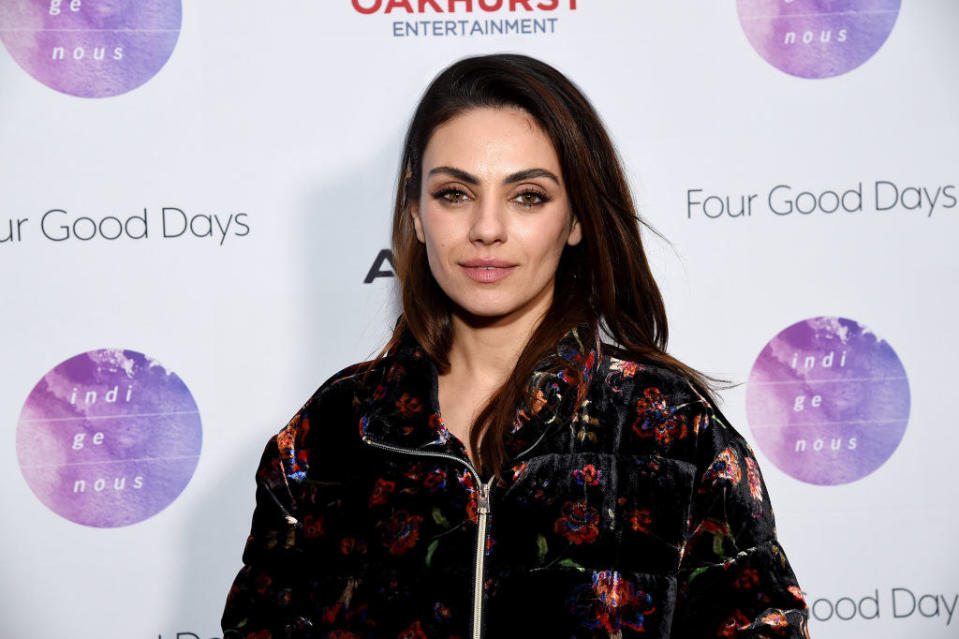 Close-up of Mila in a colorful jacket