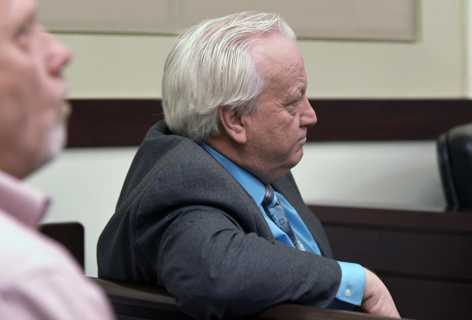 Minister Joey Spann listens as Emanuel Samson testifies during his own trial Wednesday, May 22, 2019, in Nashville, Tenn. Samson is accused of fatally shooting a woman and wounding seven people at a Nashville church in 2017. Prosecutors have said they're seeking life without parole for Samson. Spann was injured during the shooting. (Shelley Mays/The Tennessean via AP, Pool)