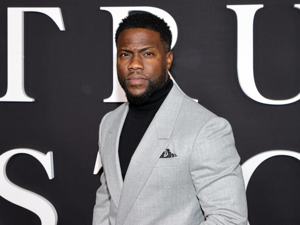 Kevin Hart in a grey suit