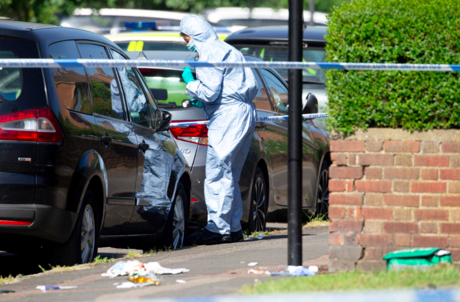 <em>Forensic teams investigate the scene of the stabbing at Harrow (SWNS)</em>