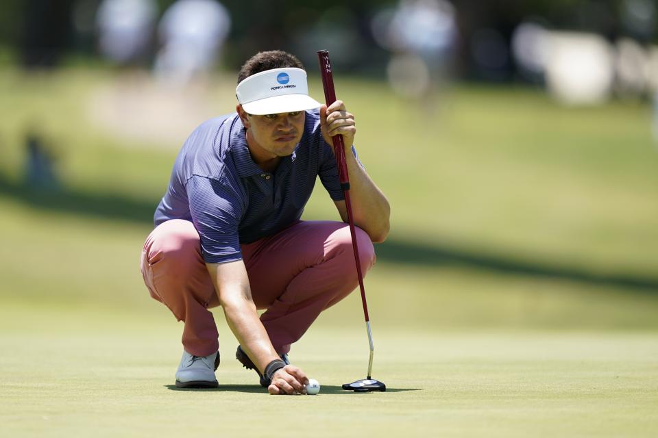 Beau Hossler lines up his putt on the 18th hole during the second round of the Charles Schwab Challenge golf tournament at the Colonial Country Club, Friday, May 27, 2022, in Fort Worth, Texas. (AP Photo/LM Otero)