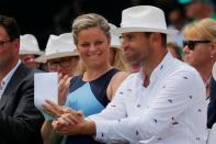 Kim Clijsters of Belgium (L) and Andy Roddick of the U.S. wait to be inducted into the International Tennis Hall of Fame in Newport, Rhode Island, U.S., July 22, 2017. REUTERS/Brian Snyder