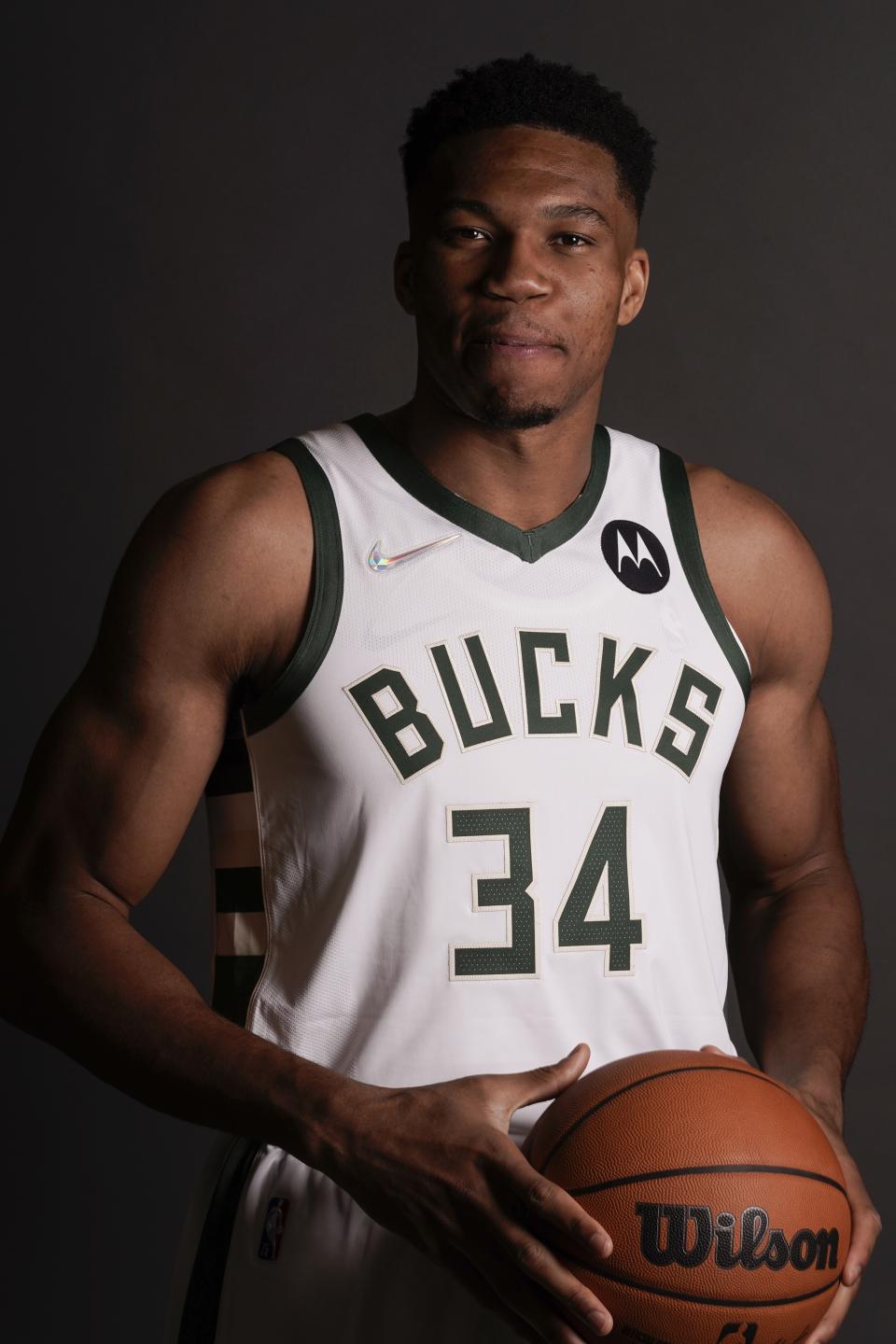 Milwaukee Bucks' Giannis Antetokounmpo poses for a picture during an NBA basketball media day Monday, Sept. 27, 2021, in Milwaukee. (AP Photo/Morry Gash)