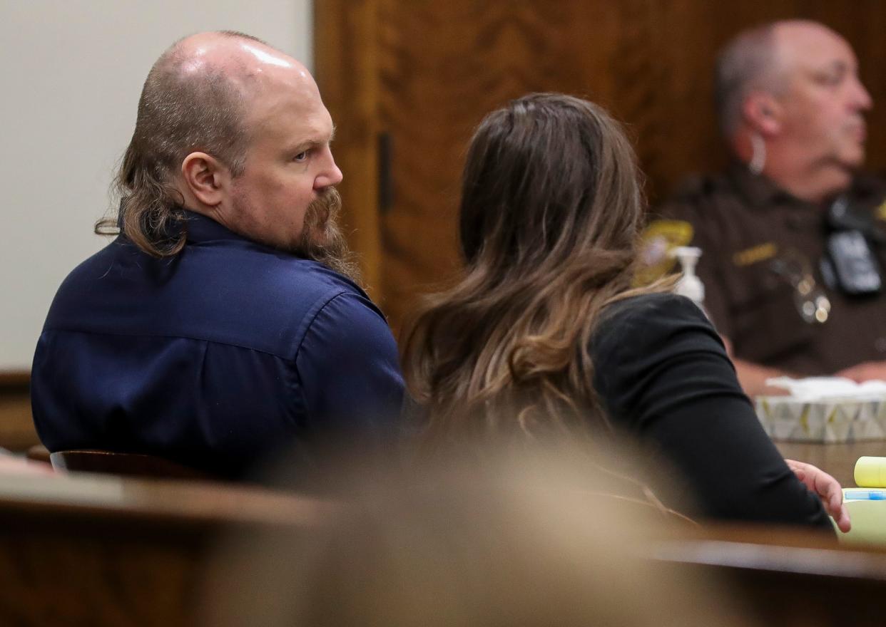 Joshua Scolman talks with defense attorney Brianna Zawada on Tuesday at the Brown County Courthouse in Green Bay. Scolman was convicted of first-degree homicide in the death of Timothy Nabors, a Black man, and the attempted homicide of a second man, who is also Black. All three men were incarcerated at Green Bay Correctional Institute at the time. Scolman was also convicted of hate crime enhancers for both charges.