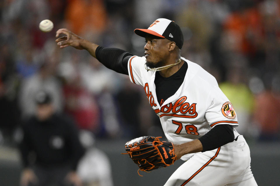 Baltimore Orioles relief pitcher Yennier Cano throws during the ninth inning of the team's baseball game against the Tampa Bay Rays, Wednesday, May 10, 2023, in Baltimore. The Orioles won 2-1. (AP Photo/Nick Wass)