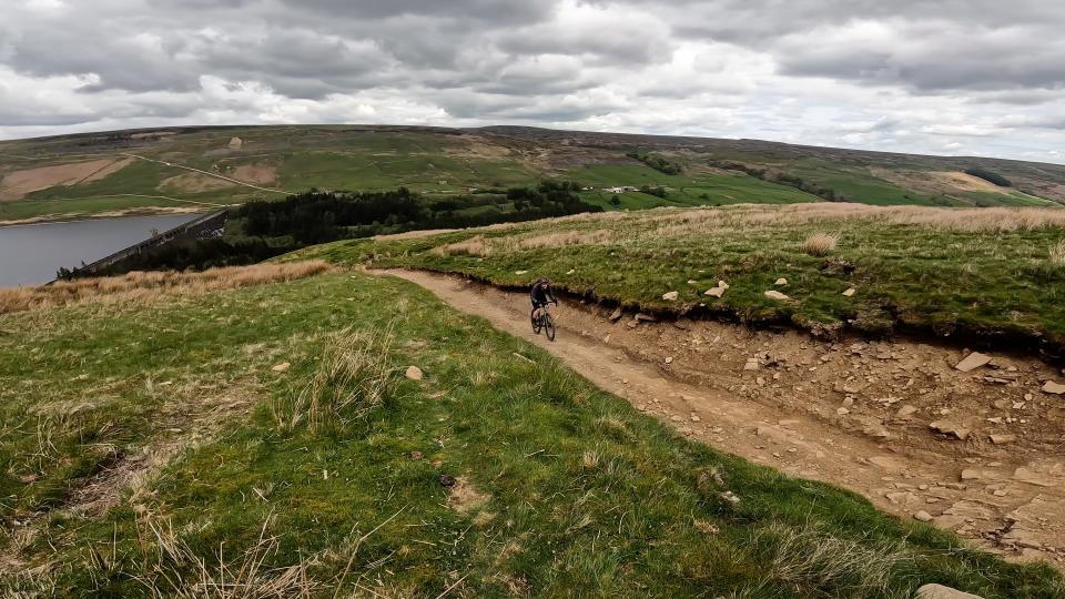 Climbing up Scar House on the mason