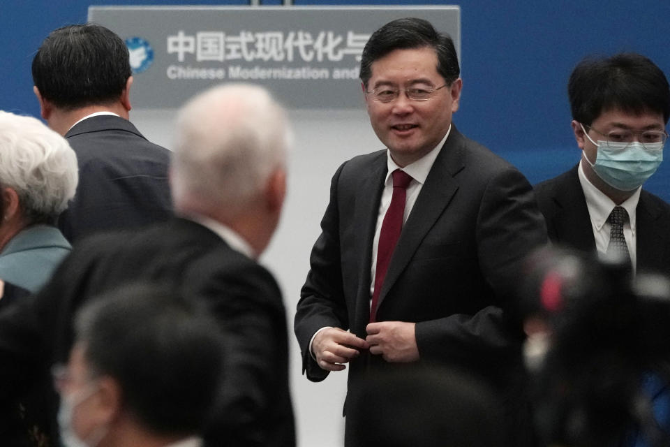 Chinese Foreign Minister Qin Gang leaves after the opening ceremony for the forum titled Chinese Modernization and the World held at The Grand Halls in Shanghai, Friday, April 21, 2023. (AP Photo/Ng Han Guan)