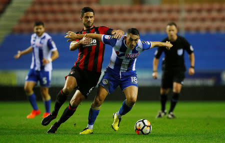 Soccer Football - FA Cup Third Round Replay - Wigan Athletic vs AFC Bournemouth - DW Stadium, Wigan, Britain - January 17, 2018 Wigan Athletic’s Gary Roberts in action with Bournemouth's Andrew Surman REUTERS/Phil Noble