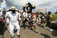 People march through the Lower Ninth Ward during a second line parade on the 10th anniversary of Hurricane Katrina on August 29, 2015 in New Orleans, Louisiana