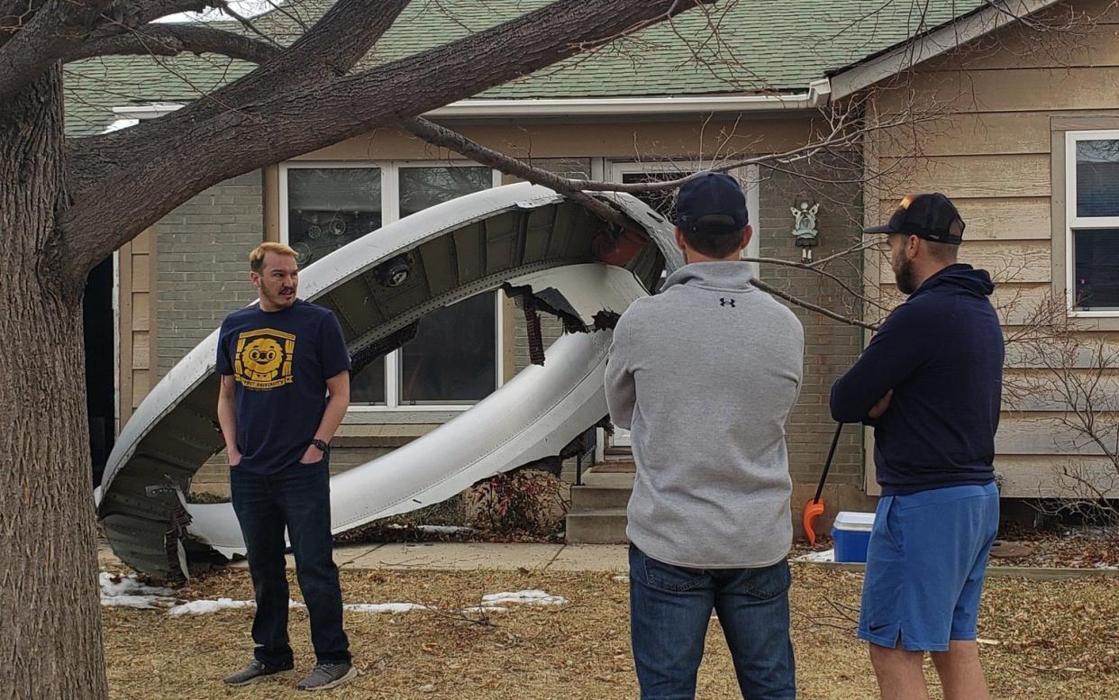 Pieces of an airplane in backyards in Broomfield, a Denver suburb