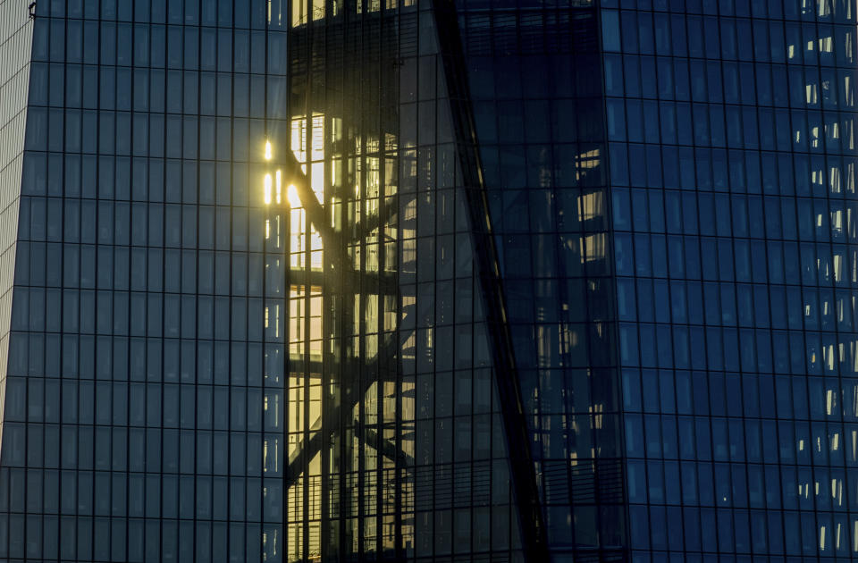 The sun raises behind the European Central Bank building in Frankfurt, Germany, Wednesday, June 14, 2023. The governing council of the ECB will meet on Thursday. (AP Photo/Michael Probst)