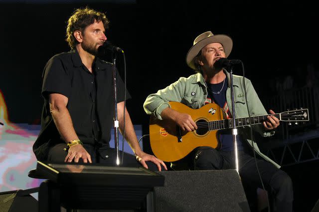 <p>Kevin Mazur/WireImage</p> Bradley Cooper and Eddie Vedder on May 25, 2024 in Napa, California.