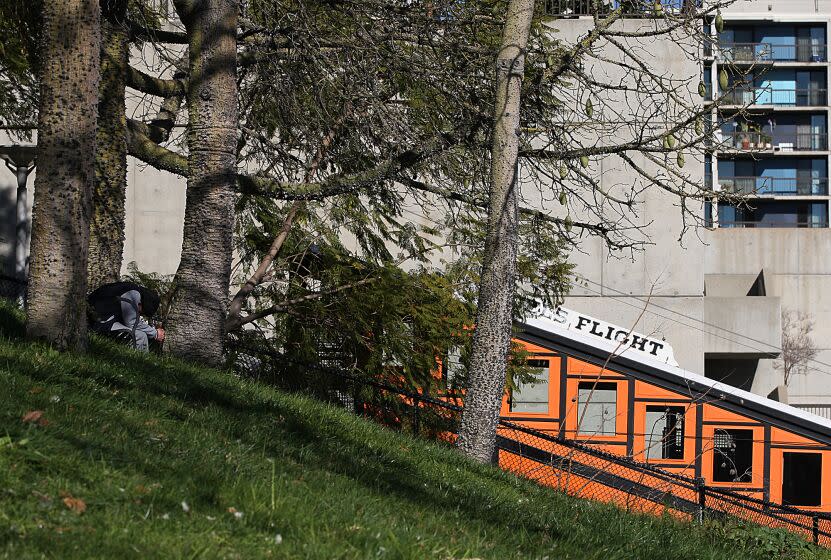 LOS ANGELES, CA, MONDAY, DECEMBER 31, 2012 -- An Angel's Flight fanicula rolls past Angel's Park as riders pay only a penny fare to commemorated it's 111th anniversery. (Robert Gauthier/Los Angeles Times)