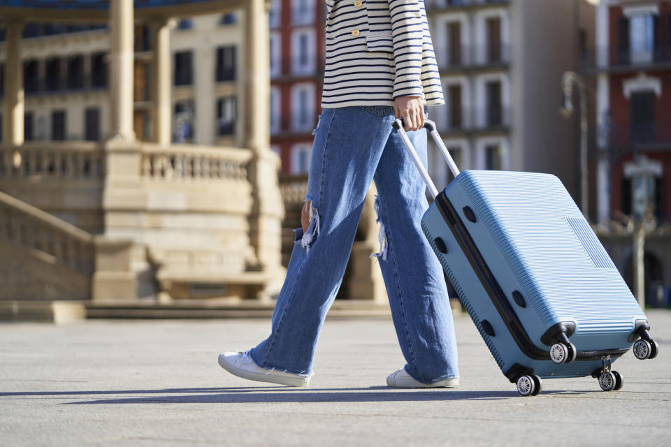 person with a large suitcase