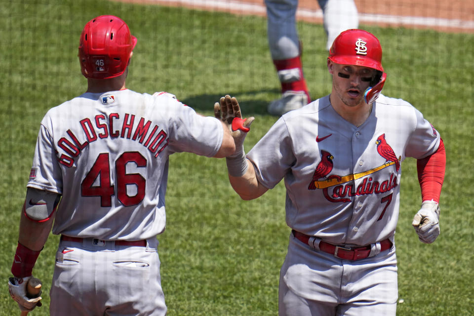 St. Louis Cardinals' Andrew Knizner (7) celebrates with Paul Goldschmidt as he returns to the dugout after hitting a solo home run off Pittsburgh Pirates starting pitcher Rich Hill during the seventh inning of a baseball game in Pittsburgh, Sunday, June 4, 2023. (AP Photo/Gene J. Puskar)