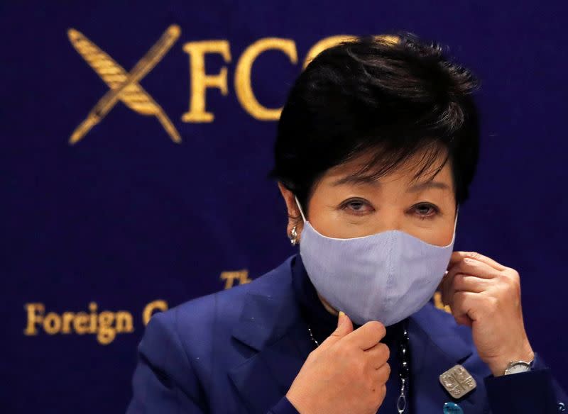 Tokyo Governor Yuriko Koike wearing a protective face mask attends a news conference, amid the coronavirus disease (COVID-19) outbreak, in Tokyo