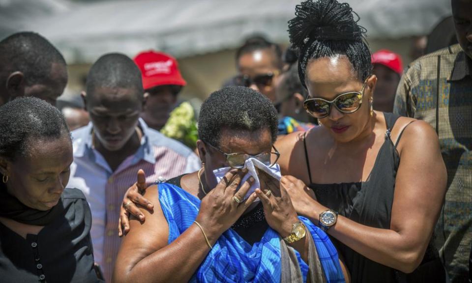 Rwandan relatives at the scene where the Ethiopian Airlines 737 Max crashed, near Bishoftu, south-east of Addis Ababa.