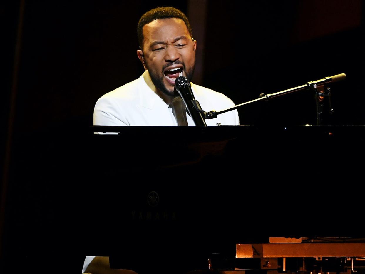 John Legend dedicated his performance of "Never Break" to his wife Chrissy Teigen.