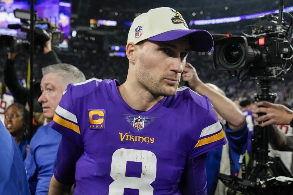 Minnesota Vikings' Kirk Cousins walks off the field after an NFL wild card football game against the New York Giants Sunday, Jan. 15, 2023, in Minneapolis. The Giants won 31-24. (AP Photo/Charlie Neibergall)