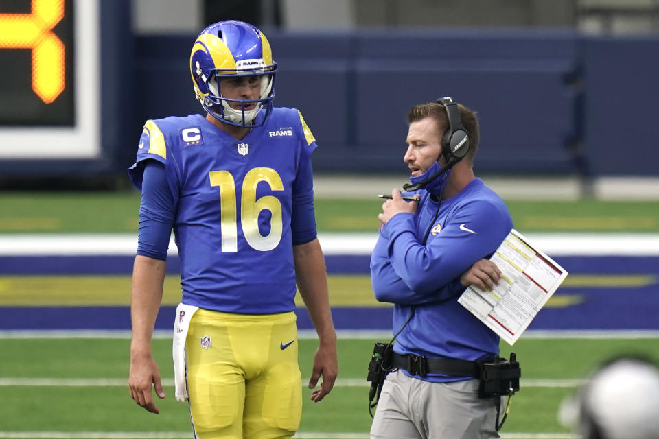 Los Angeles Rams head coach Sean McVay, right, talks to quarterback Jared Goff (16) during the second half of an NFL football game Sunday, Oct. 4, 2020, in Inglewood, Calif. McVay is coaching his first game at FedEx Field since leaving Washington and taking the Los Angeles Rams to the Super Bowl. (AP Photo/Jae C. Hong)