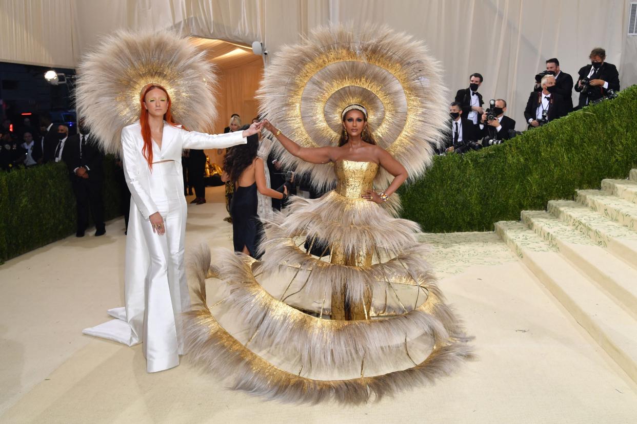 Iman, right, and fashion designer Harris Reed arrive for the 2021 Met Gala at the Metropolitan Museum of Art on Sept. 13, 2021 in New York.