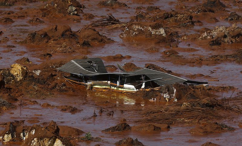 Debris of a house is pictured at Bento Rodrigues district, which was covered with mud after a dam owned by Vale SA and BHP Billiton Ltd burst in Mariana