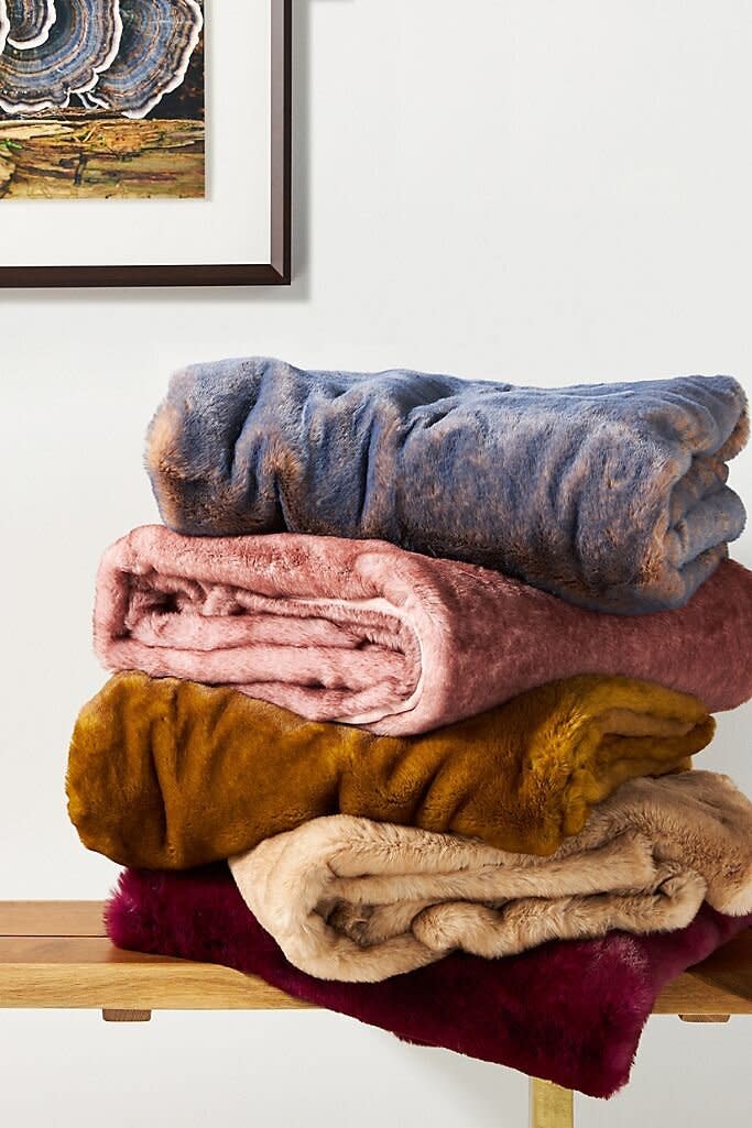 This luxe-looking blanket will give them the feel of faux fur that's soft to the touch. They can throw this throw over a couch or at the end of their bed. <a href="https://fave.co/379yfif" target="_blank" rel="noopener noreferrer">Find it for $128 at Anthropologie</a>.