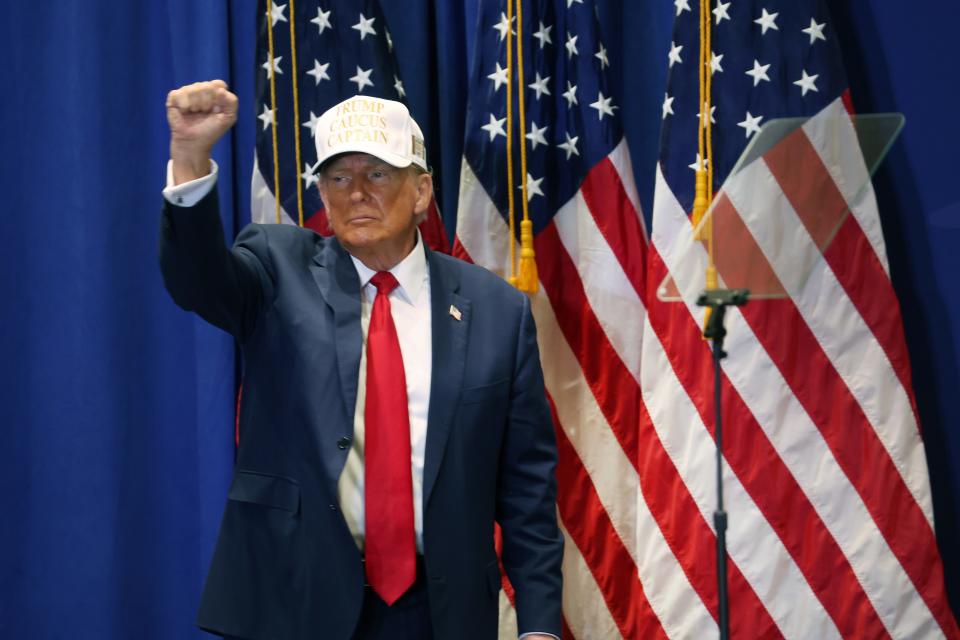 Former President Donald Trump leaves a rally at Simpson College on Jan. 14, 2024 in Indianola, Iowa.