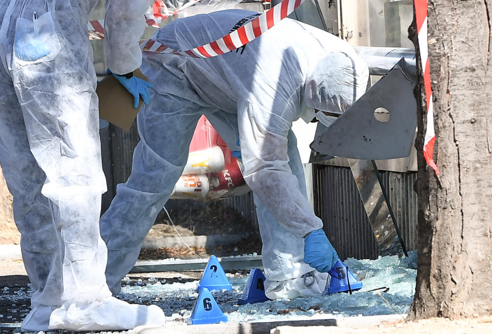 <p>French forensic police inspect the site following a car crash on Aug. 21, 2017, in the southern Mediterranean city of Marseille. (Photo: Boris Horvat/AFP/Getty Images) </p>