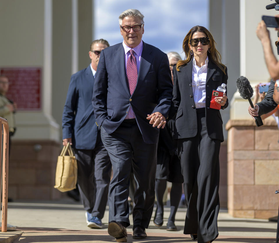 Actor Alec Baldwin and his wife Hilaria Baldwin leave District Court following the day's proceedings in his involuntary manslaughter trial, in Santa Fe, N.M., Wednesday, July 10, 2024. (AP Photo/Roberto E. Rosales)