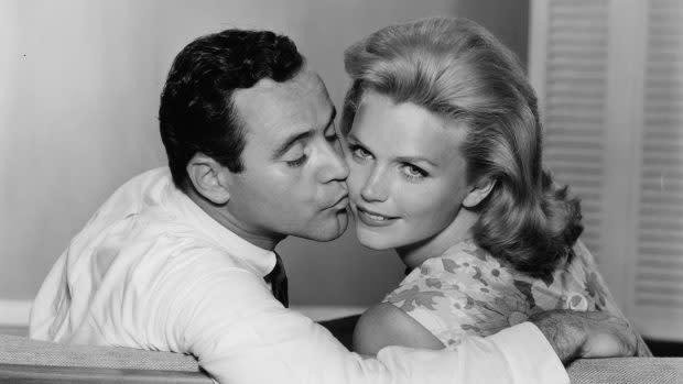 <p><a href="https://www.gettyimages.com/detail/news-photo/jack-lemmon-puckers-up-for-lee-remick-in-a-scene-from-the-news-photo/136562579" rel="nofollow noopener" target="_blank" data-ylk="slk:Warner Brothers/Getty Images;elm:context_link;itc:0;sec:content-canvas" class="link ">Warner Brothers/Getty Images</a></p>