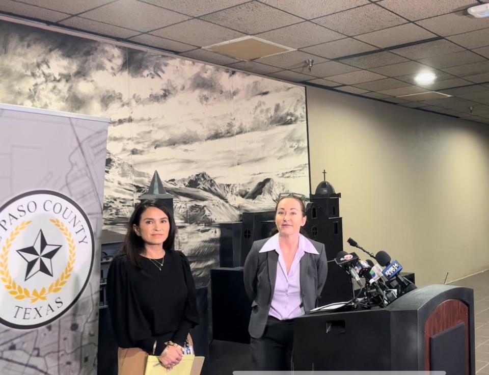 El Paso County Public Defender Kelli Childress, center, answers questions at a news conference Tuesday, April 2, 2024, at the Enrique Moreno County Courthouse regarding the arrests of hundreds of migrants accused of participating in a "riot' at the border fence in El Paso's Lower Valley.