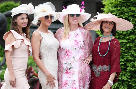 May 4, 2018; Louisville, KY, USA; Women in derby hats pose for a photo during the 2018 Kentucky Oaks at Churchill Downs. Mandatory Credit: Mark Zerof-USA TODAY Sports