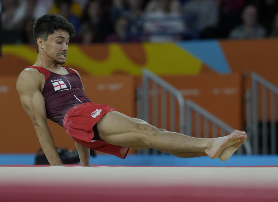 Jake Jarman of England competes at Floor exercise in the men's all-around finals at the Commonwealth Games, in Birmingham, England, Sunday, July 31, 2022. (AP Photo/Manish Swarup)