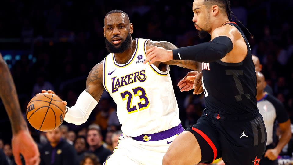 LeBron James controls the ball against Dillon Brooks of the Houston Rockets in the first quarter. - Ronald Martinez/Getty Images