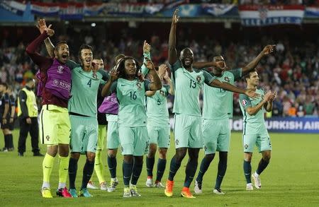 Football Soccer - Croatia v Portugal - EURO 2016 - Round of 16 - Stade Bollaert-Delelis, Lens, France - 25/6/16 Portugal players celebrate after the game REUTERS/Gonzalo Fuentes/ Livepic