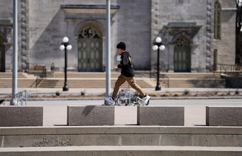 People enjoy Easter Monday as they visit the National Gallery of Canada in downtown Ottawa  April 18, 2022.